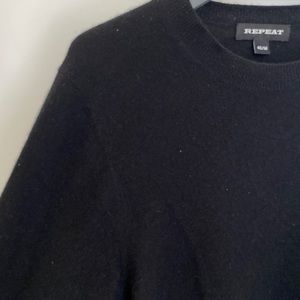 black repeat sweater